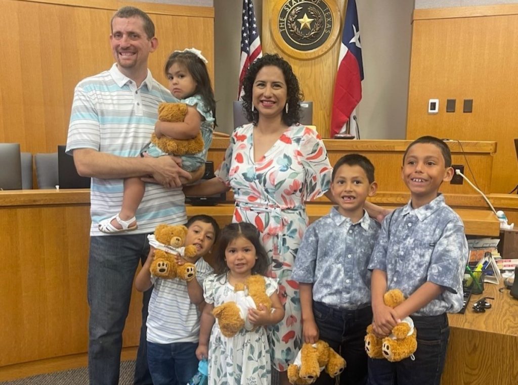 Tim and Erica Fauss with their adopted family